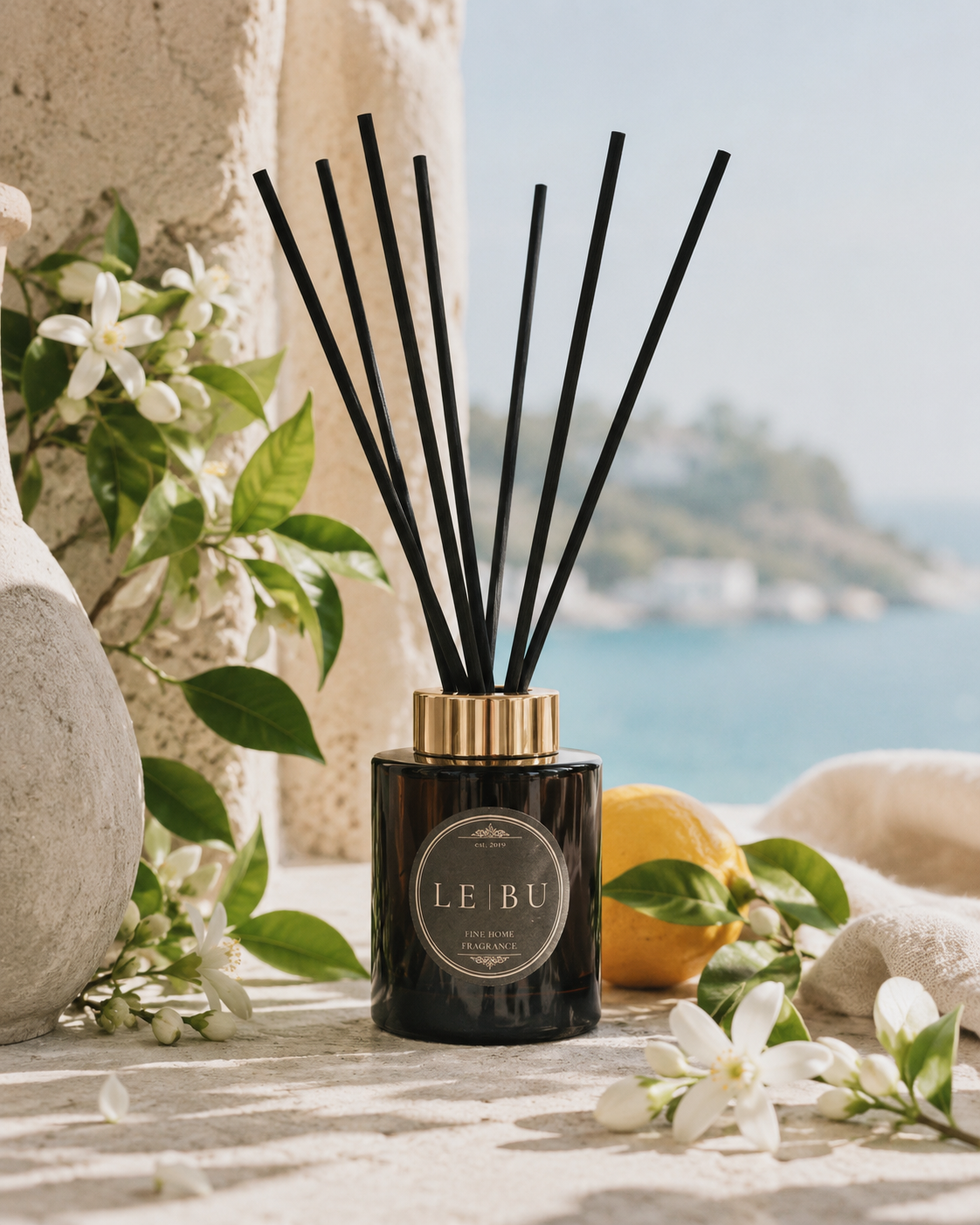 LE BU dark green glass reed diffuser with black reeds styled for luxury-feel home fragrance
