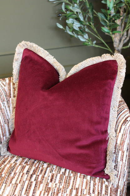 Langford Claret fringed velvet cushion in a deep claret tone, 55 x 55cm