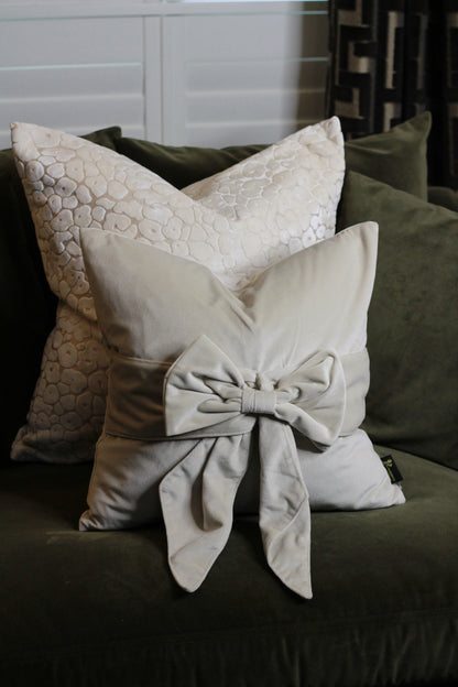 Cream Bow Velvet Cushion – decorative cushion at Leya Buster Interiors