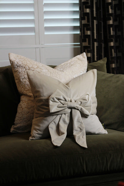 Cream Bow Velvet Cushion styled view – Leya Buster Interiors