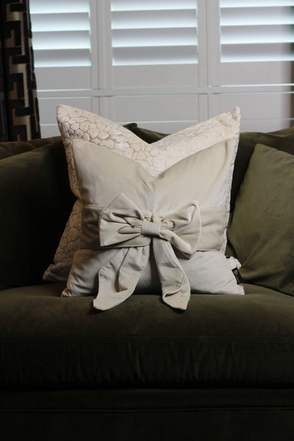 Cream Bow Velvet Cushion styled view – Leya Buster Interiors