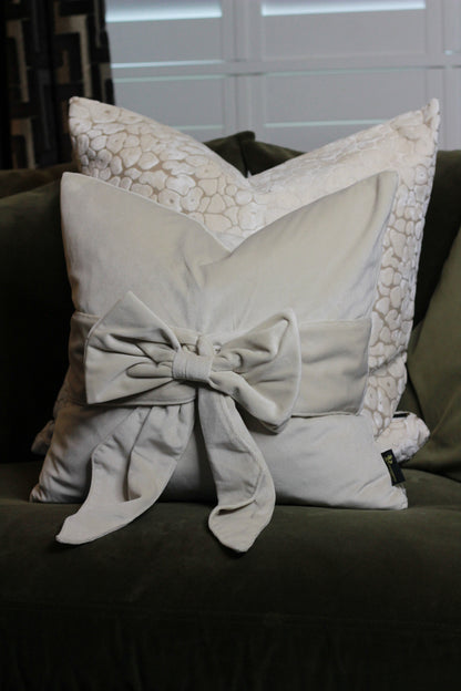 Cream Bow Velvet Cushion styled view – Leya Buster Interiors